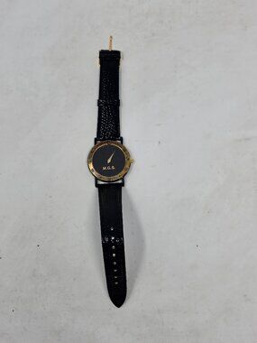M.G.S. Quartz Wristwatch Black Dial Gold Tone Case Genuine Leather Strap